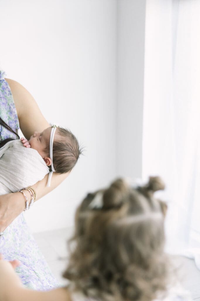 mom holding her newborn baby